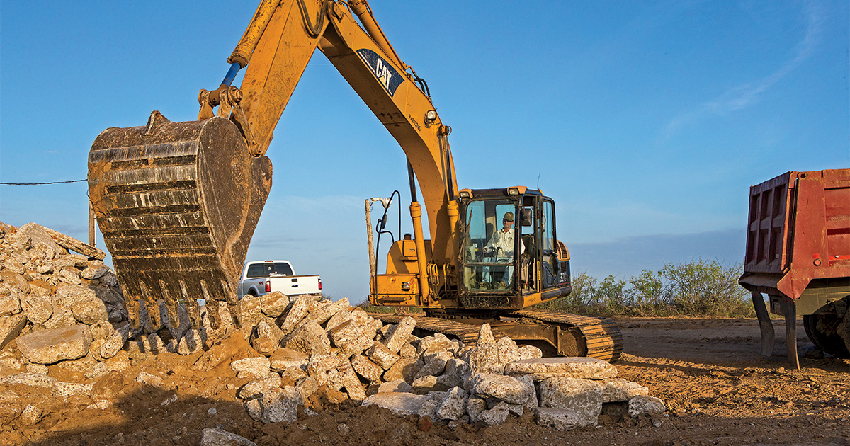 Dirt work being done on wetland restoration project. Photo by Todd J. Steele