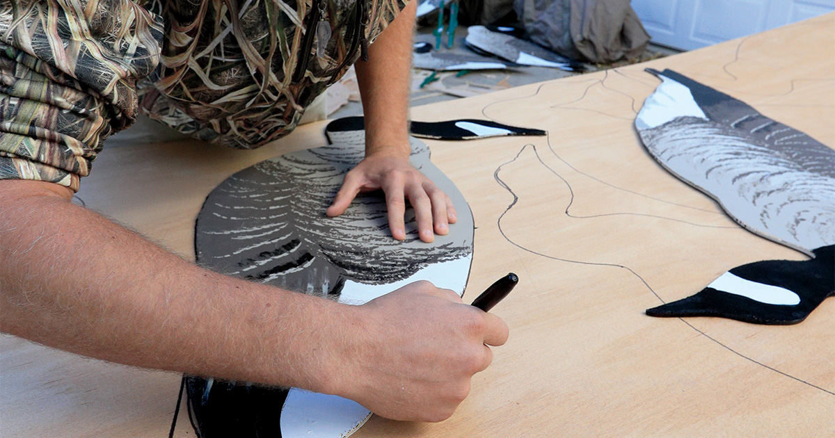 Waterfowl hunter making decoys. By DougSteinke.com_Silhouette Decoys.jpg